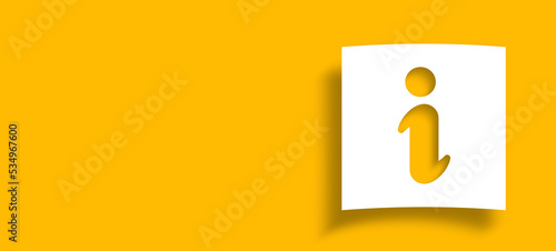 Note paper and information sign with copy space on panoramic yellow background photo