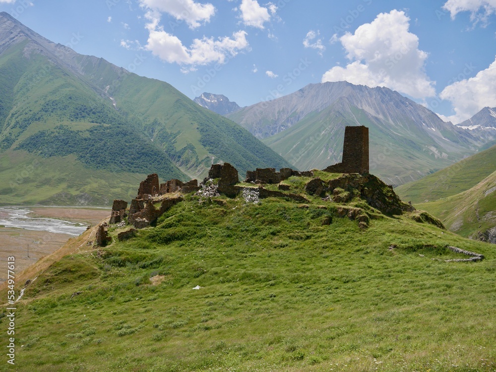 Zakagori fortress with defense tower in beautiful Truso valley in Kazbegi region, Caucasus mountains, Georgia.