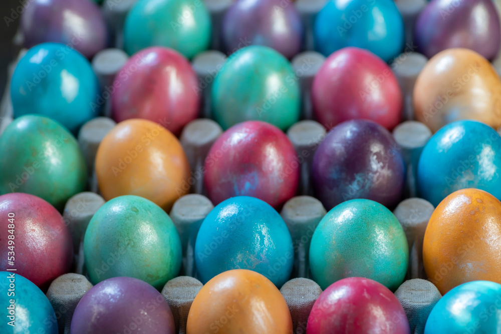 Easter background with hand painted purple, blue, green, orange Easter background with hand painted purple, blue, green, orange