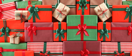Many different Christmas presents as background