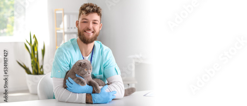 Male veterinarian with Scot...