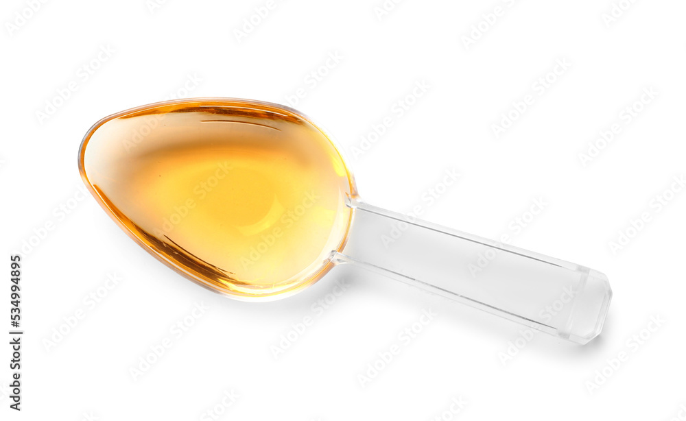 Spoon of cough syrup on white background Spoon of cough syrup on white background