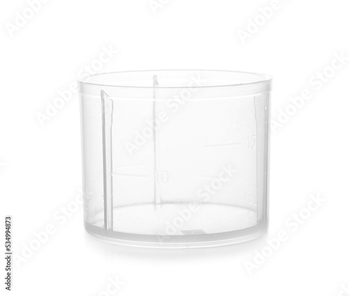 Tableau sur toile Empty measuring cup on white background