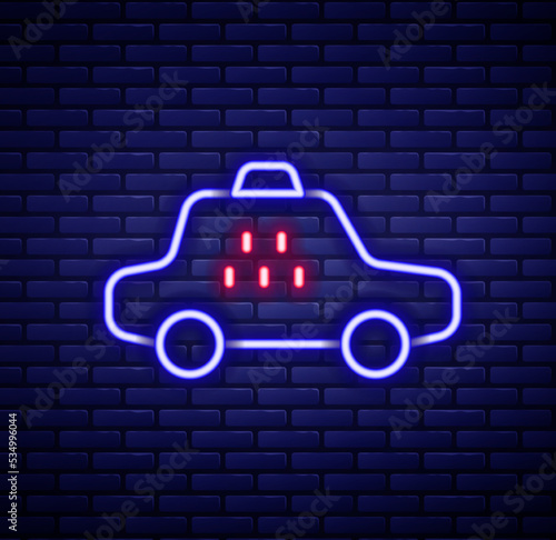 Glowing neon line Taxi car icon isolated on brick wall background. Colorful outline concept. Vector