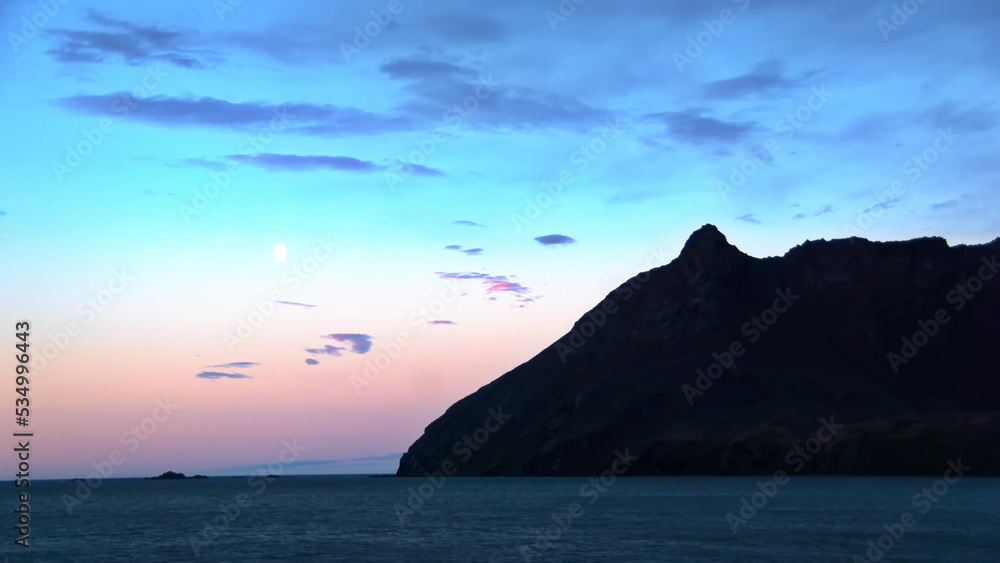 Sunset over the mountains near Fortuna Bay, South Georgia Island Sunset over the mountains near Fortuna Bay, South Georgia Island