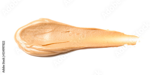 Stroke of nut butter on white background
