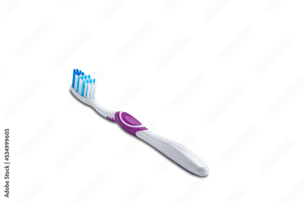 View of purple handle toothbrush isolated on white background with clipping path. View of purple handle toothbrush isolated on white background with clipping path.