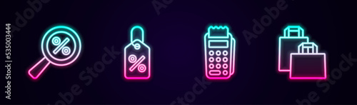 Set line Magnifying glass with percent, Discount tag, POS terminal and Paper shopping bag. Glowing neon icon. Vector
