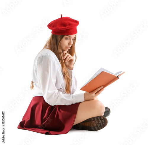 Stylish young woman reading...