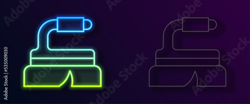 Glowing neon line Brush for cleaning icon isolated on black background. Cleaning service concept. Vector