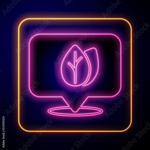 Glowing neon Location pin with leaf inside icon isolated on black background. Leaves sign. Fresh natural product symbol. Vector