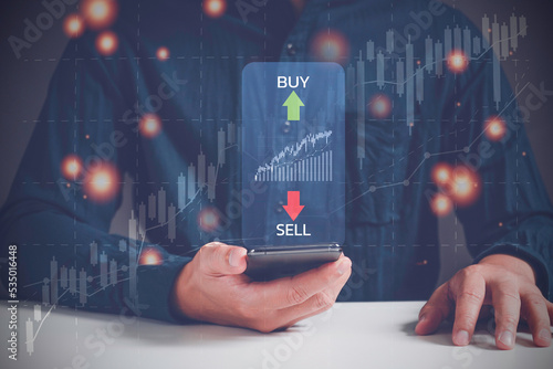 Businessman trading graph financial data. Business finance background.Business finance technology concept.2023 business finance technology and investment concept.