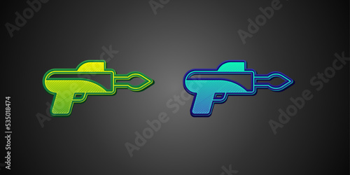 Green and blue Fishing harpoon icon isolated on black background. Fishery manufacturers for catching fish under water. Diving underwater equipment. Vector