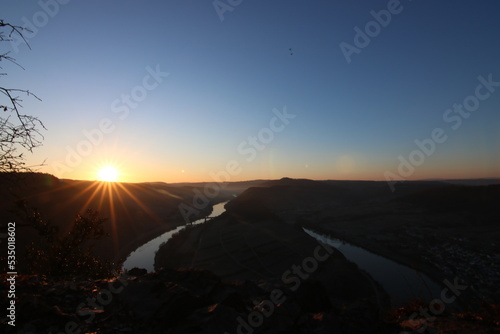 The Moselle loop at sunrise, beautiful landscape shot from a vantage point. Backlight, Sonnenstern cliff. Nice cold winter morning