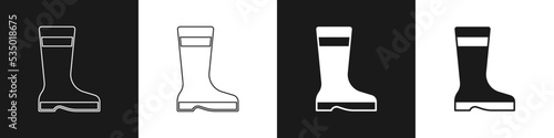 Set Fishing boots icon isolated on black and white background. Waterproof rubber boot. Gumboots for rainy weather, fishing, hunter, gardening. Vector