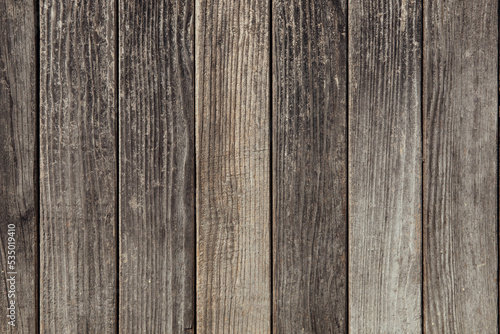 Old wood texture. Vertical boards with knots and nails, copy space
