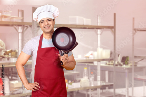 Man is cook. Portrait of ha...