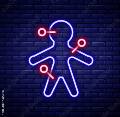 Glowing neon line Voodoo doll icon isolated on brick wall background. Colorful outline concept. Vector