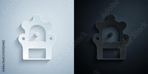 Paper cut Medieval throne icon isolated on grey and black background. Paper art style. Vector