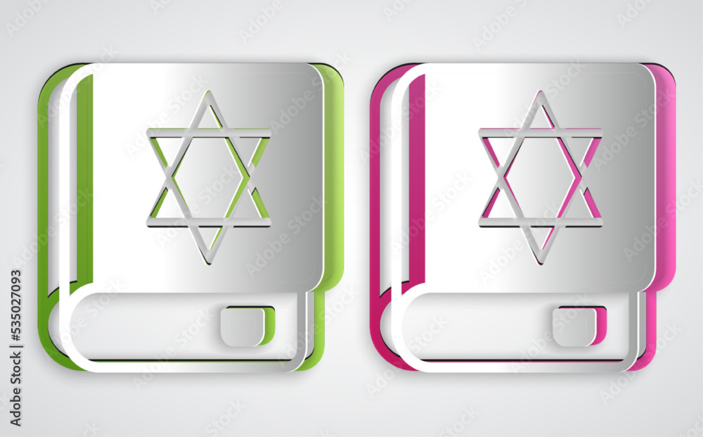 Paper cut Jewish torah book icon isolated on grey background. On the cover of the Bible is the image of the Star of David. Paper art style. Vector