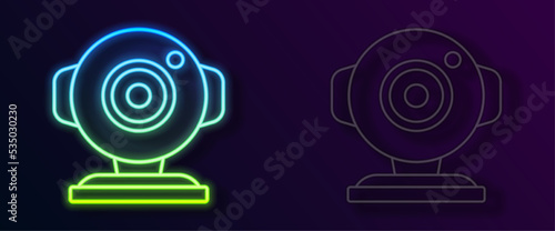 Glowing neon line Web camera icon isolated on black background. Chat camera. Webcam icon. Vector