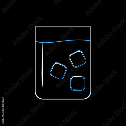 Glass of still water with ice blocks