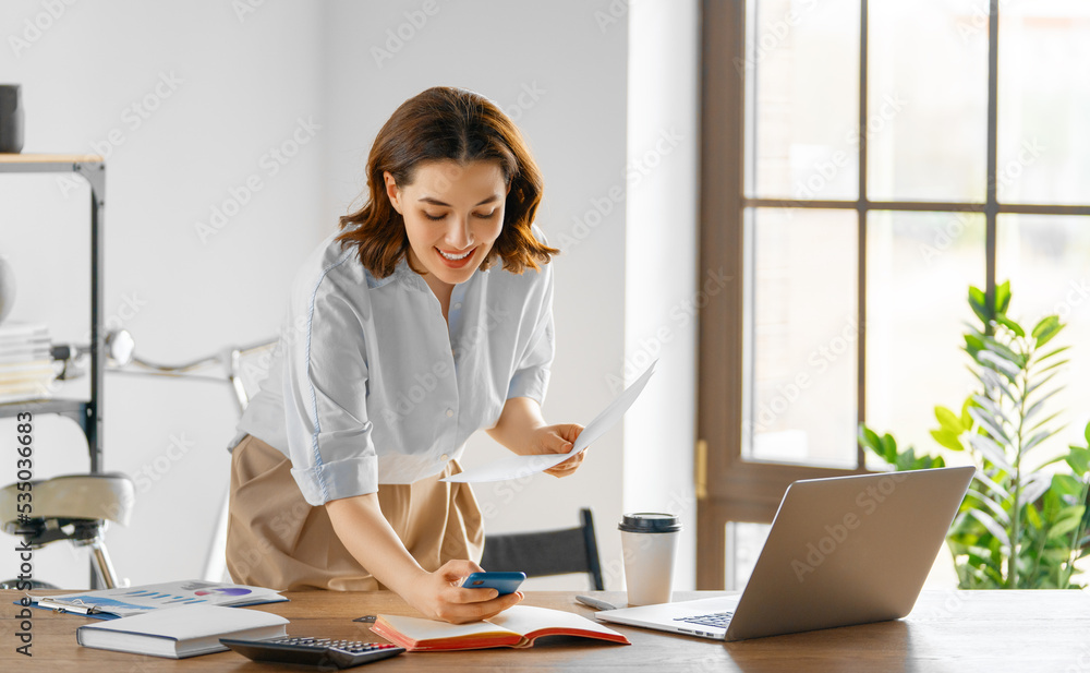 woman working in the office woman working in the office