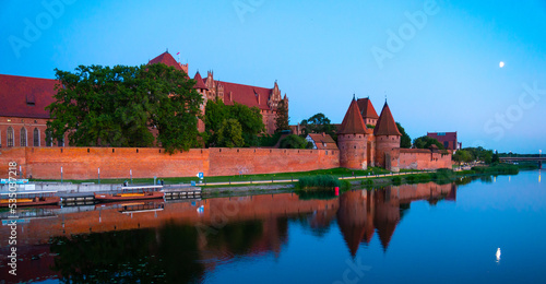 Marienburg castle the largest medieval brick castle in the world in the city of Malbork evening view at night