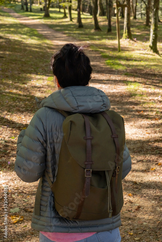 woman hiking through urkiola natural park 