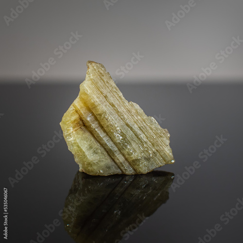 A wonderful item from the mineralogical collection. Beryl mineral crystal on a dark background.