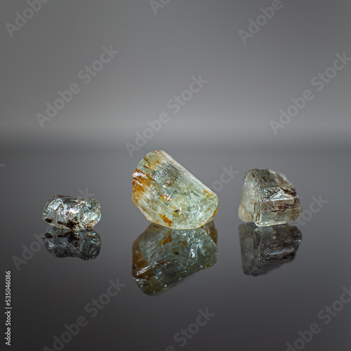 A wonderful item from the mineralogical collection. Beryl mineral crystal on a dark background.