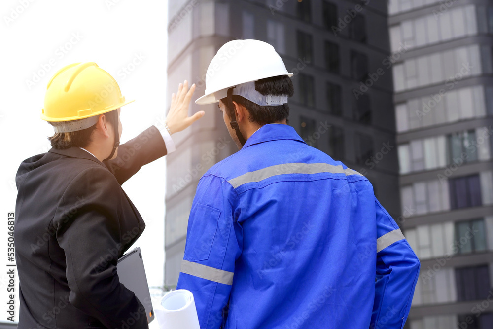 Businessman and construction engineer having a discussion. Businessman and construction engineer having a discussion.