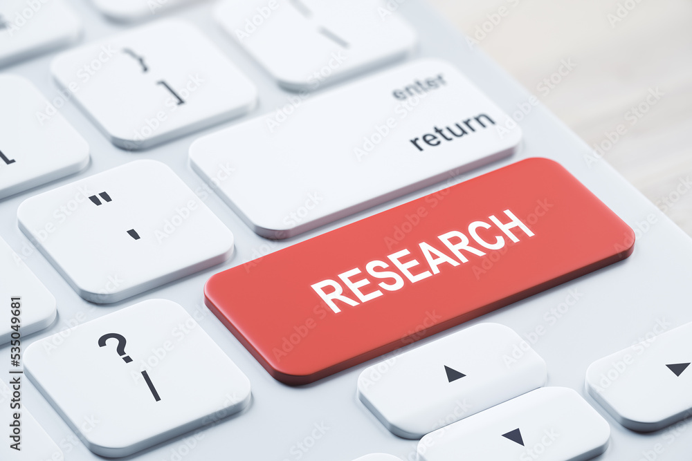 Close up of red research button on white keyboard placed on blurry wooden desktop. concept. 3D Rendering. Close up of red research button on white keyboard placed on blurry wooden desktop. concept. 3D Rendering.