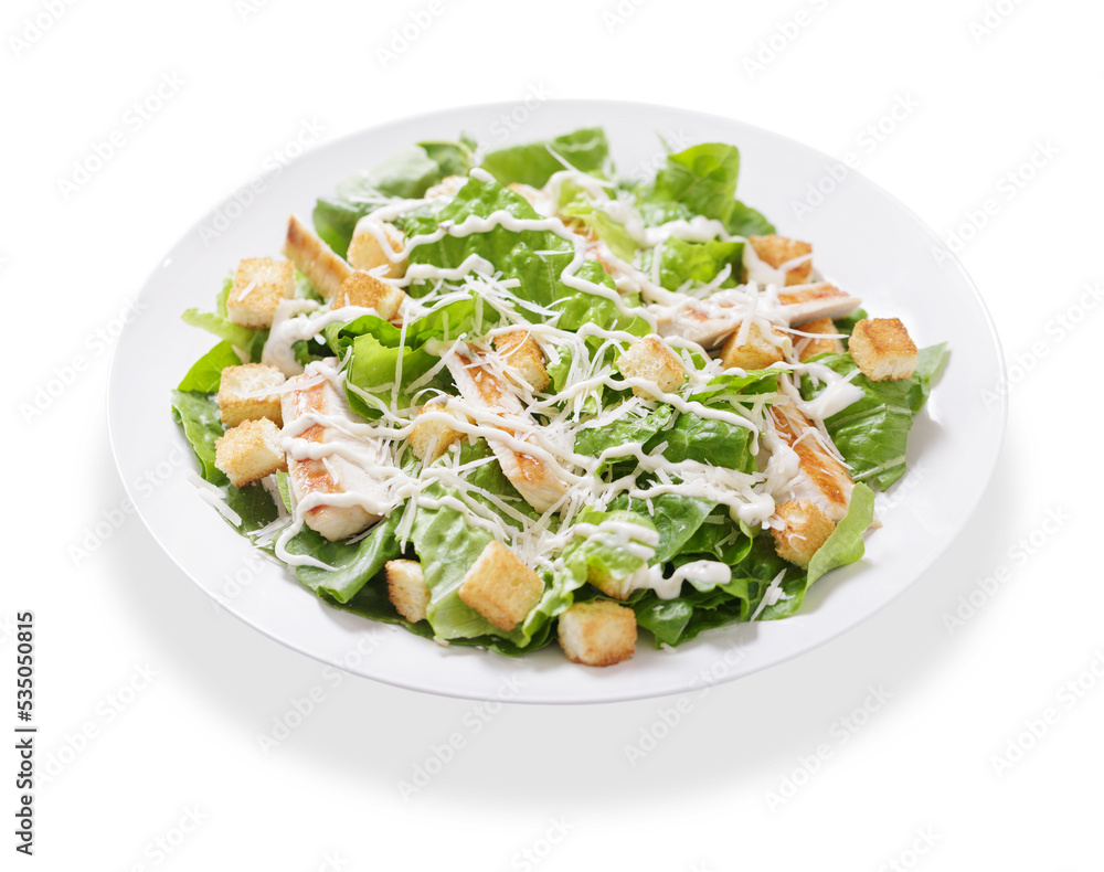plate of chicken caesar salad on white background plate of chicken caesar salad on white background