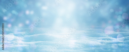 Winter Christmas background with magic Bokeh lights. Light blue snowscape. Banner, Panorama.