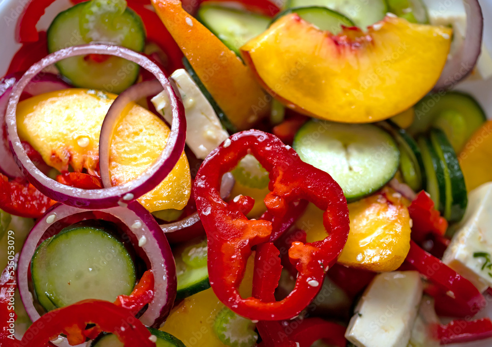 Salad of bell peppers, cucumbers, peaches, celery, red onions and sesame seeds. Vegan food and snacks. Clean eating, raw food, detox, plant based Salad of bell peppers, cucumbers, peaches, celery, red onions and sesame seeds. Vegan food and snacks. Clean eating, raw food, detox, plant based