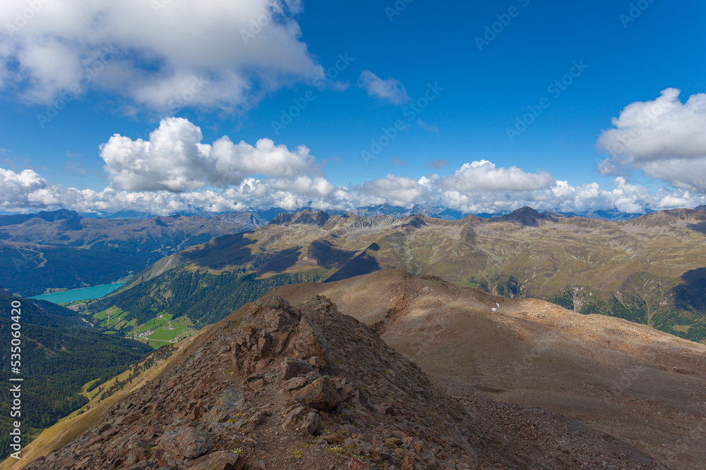 Awesome summer boundless alpine panorama between Italy, Switzerland and Austria with Resia Lake visible, Vallelunga, Alto Adige Sudtirol, Italy