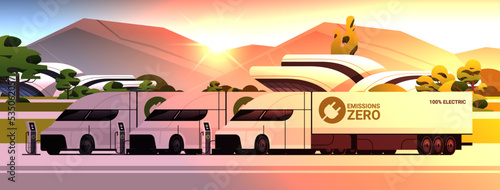 electric semi-trucks charging battery vehicles at recharging power station charger EV management zero emissions transport