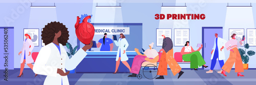 doctor holding human transplantation organ heart model prints on 3d bio printer medical printing biological engineering bioprinting