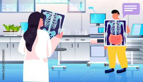 doctor examining stomach X-ray of male patient health care medical treatment concept