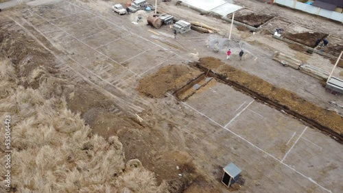 reinforced concrete house foundation, poured concrete floor and brick walls.