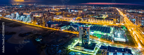 Panorama night city Kazan. View of the new quarters of new buildings in the evening illumination