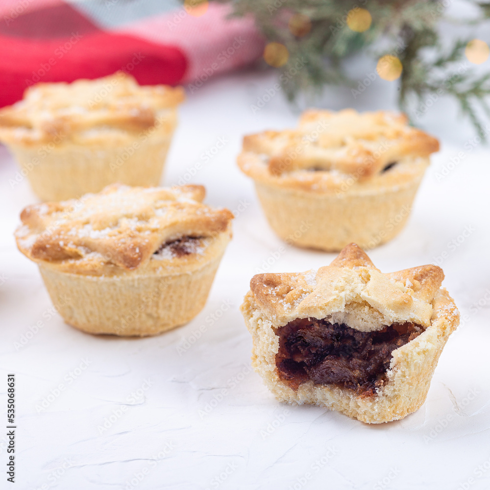 Traditional British Christmas mince pies with a fruit filling, square format Traditional British Christmas mince pies with a fruit filling, square format