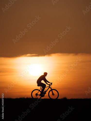 Sunset Bike rider silhouette