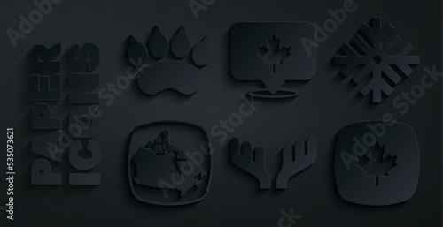 Set Deer antlers, Snowflake, Canada map, Canadian maple leaf, and Bear paw footprint icon. Vector