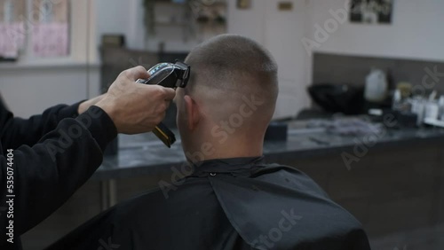 The process of men's haircuts in the barbershop. photo