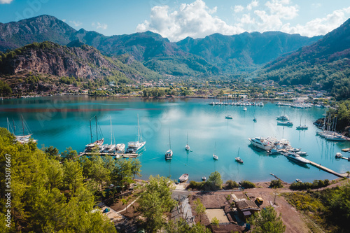 Fototapeta Naklejka Na Ścianę i Meble -  Yacht club about Orhaniye village and Kizkumu beach, on Bozburun peninsula near Marmaris resort town in Turkey.