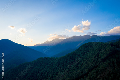 Rosa Khutor aerial panoramic view. Evening landscape in the mountains of the Caucasus. Sochi, Russia