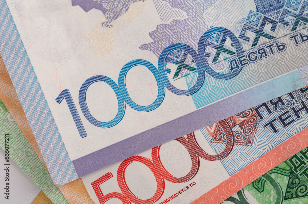 Kazakhstan money - tenge. 500, 1000, 2000, 5000, 10000 banknotes. Close up of tenge on white background.