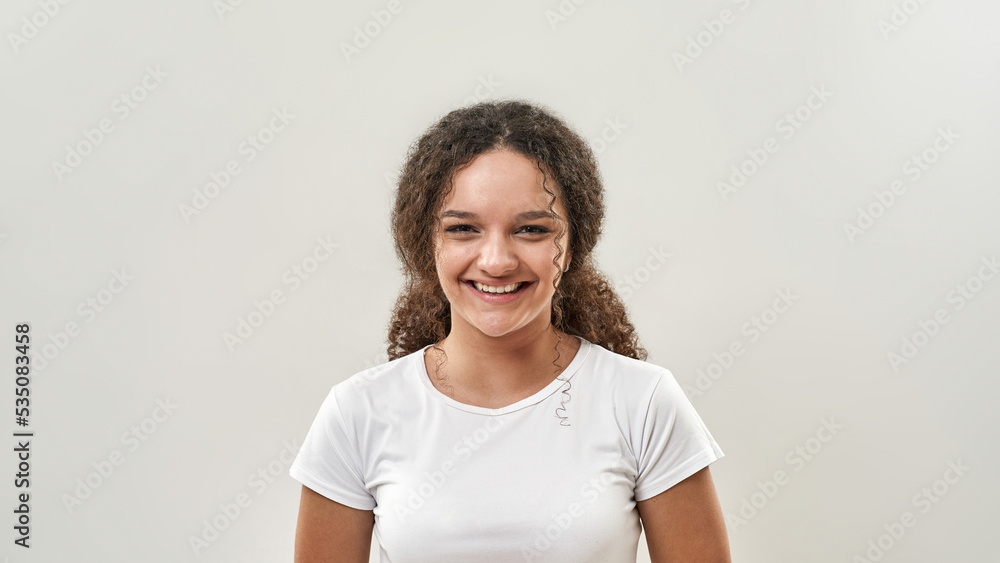 Portrait of smiling teenage girl looking at camera Portrait of smiling teenage girl looking at camera